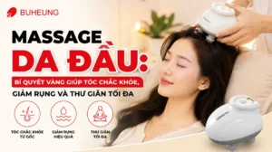 Hình ảnh người phụ nữ đang massage da đầu thư giãn, gương mặt thoải mái, thể hiện sự tận hưởng liệu pháp giúp tóc chắc khỏe và giảm rụng.