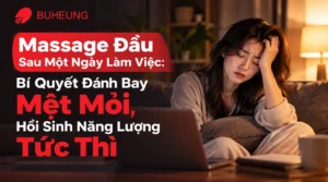 Hình ảnh một người phụ nữ trẻ mệt mỏi, đau đầu sau một ngày làm việc căng thẳng, thể hiện nhu cầu massage đầu để giảm mệt mỏi và phục hồi năng lượng.